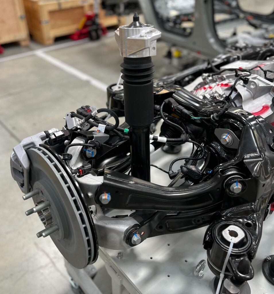 RJ Scaringe Shows Off R2’s “Starfish” Suspension Design